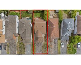 A red line is drawn on an aerial image of a neighborhood.