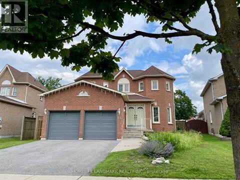 A large brick house with a garage is for sale.