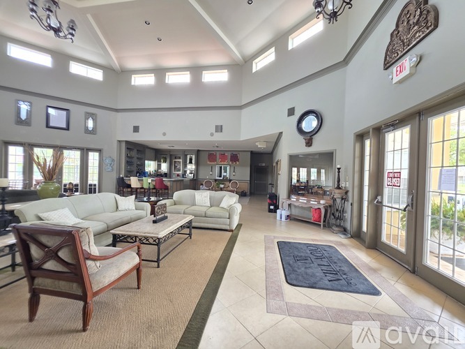 A living room with a sofa set and a coffee table.