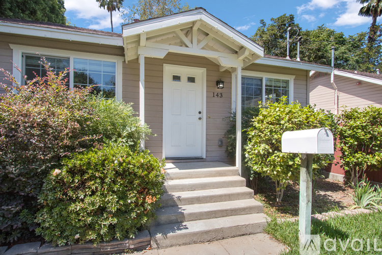 A house with the number 143 on the door.