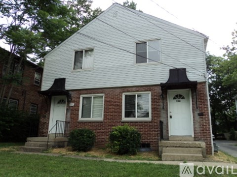 A house with a white door and windows.