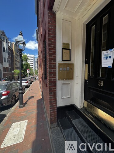 A street view with a building number 59.