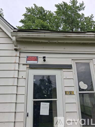 A sign on a door reads "PRIME PROPERTY".