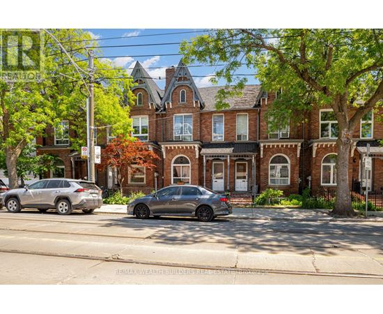 A street view of a residential area with a house and parked cars.