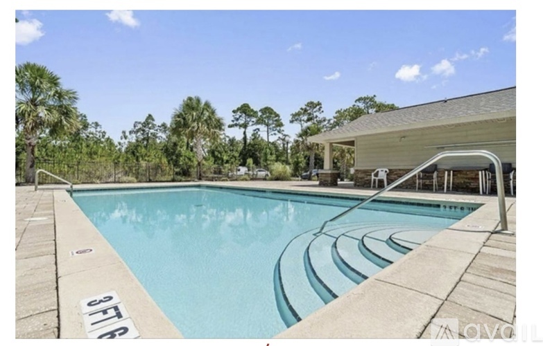 A swimming pool with the number 8 on the edge.