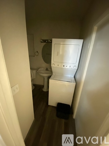 A small bathroom with a toilet and sink.