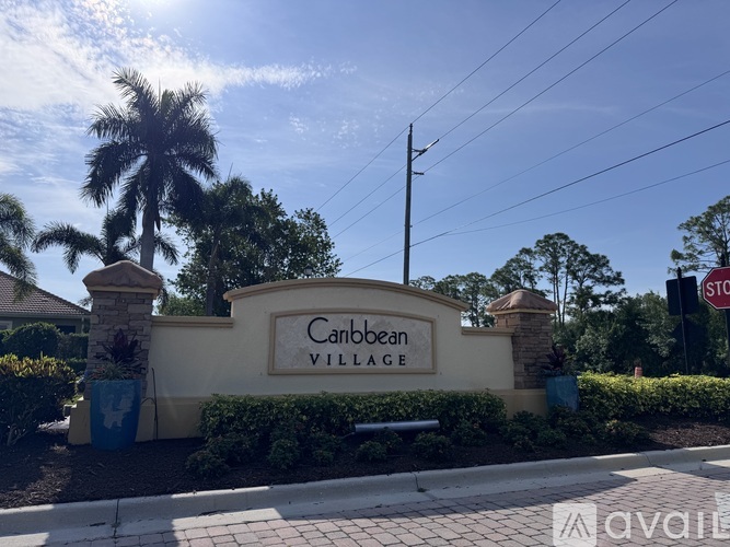 The entrance to Canbean Village is marked by a large sign.