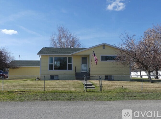A house with a flag on the front.