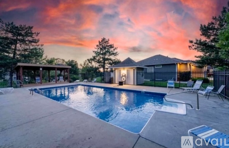 A house with a pool in the backyard.
