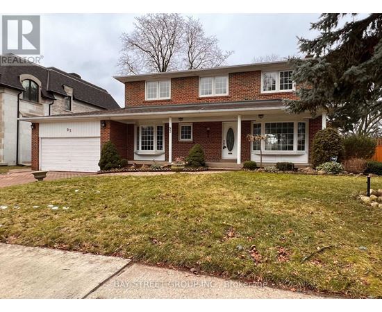 A house with a bay window is for sale.