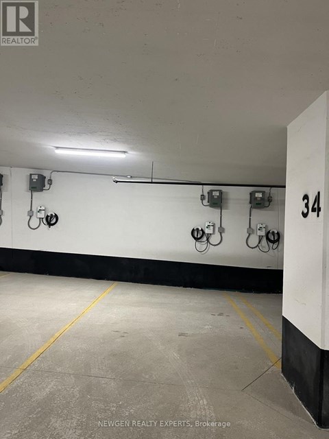 A parking garage with 34 marked on the wall.