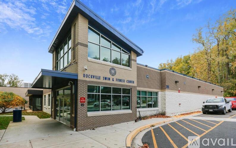 A building with the sign "Rockville Swim & Fitness Center" is shown.