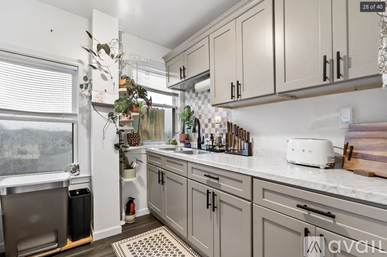 A kitchen with a window and a sink.