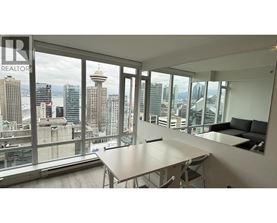 A conference room with a view of the cityscape.
