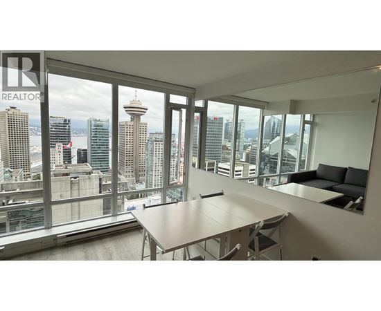 A conference room with a view of the cityscape.