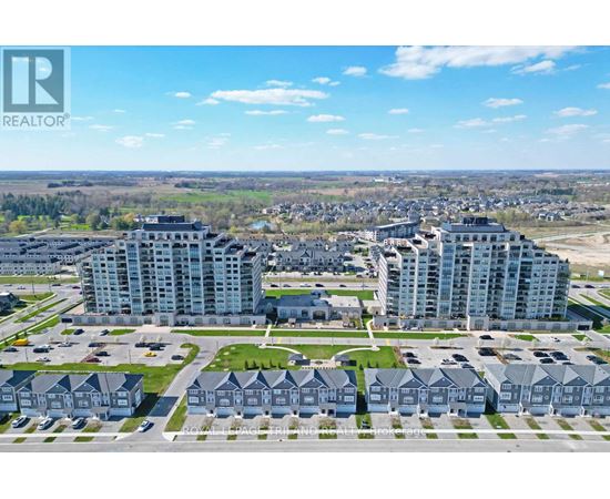 A real estate company logo is displayed on an aerial view of a residential area with multiple buildings.