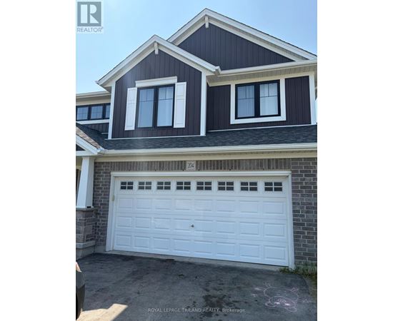A two-story house with a white garage door.