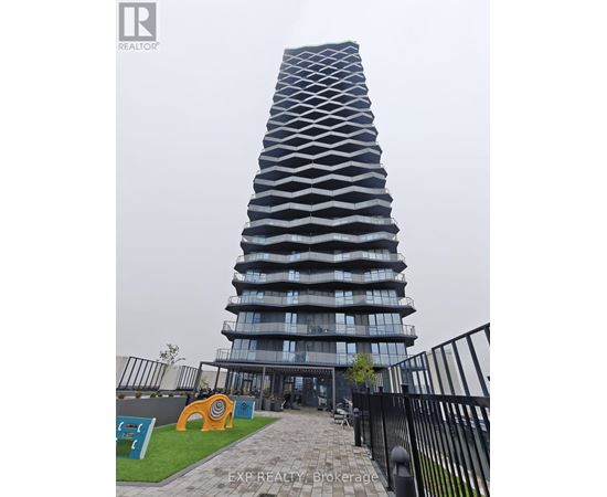 A tall building with a unique design is shown in the image.