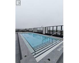 A pool with the word shallow written on the floor.