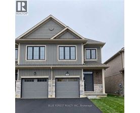 A two-story house with a garage is for sale in Brokerage.