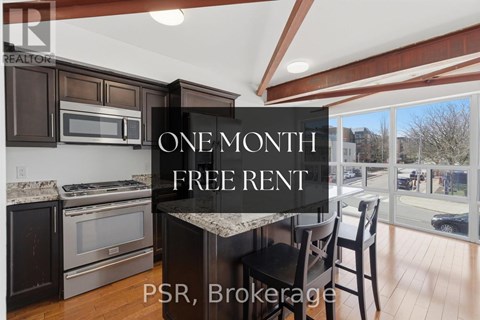 A kitchen with a stove top oven and a refrigerator with a water dispenser.