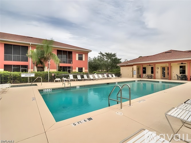 A pool with a ladder and a sign that says 5 FT. 6IN.