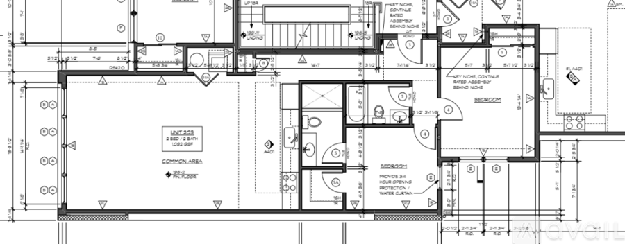 A detailed architectural floor plan shows a building with multiple rooms and labeled features.