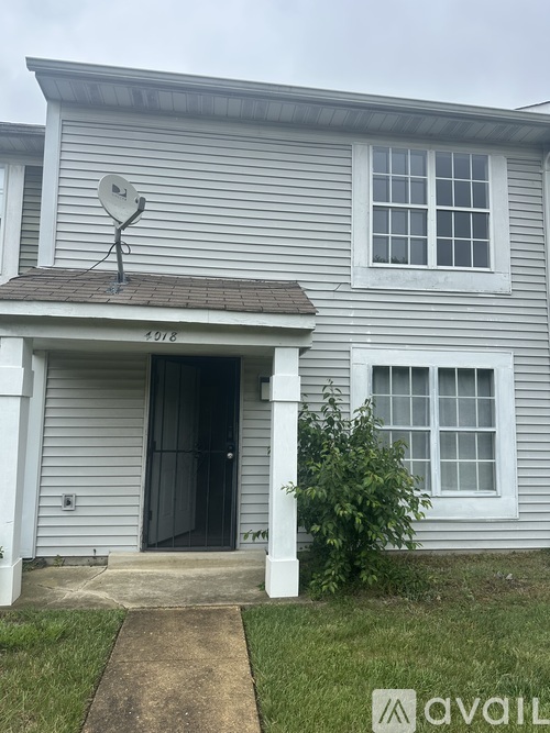A house numbered 9176 is for sale.