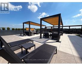 A sunny day at the rooftop patio of Keller Williams Complete Realty.