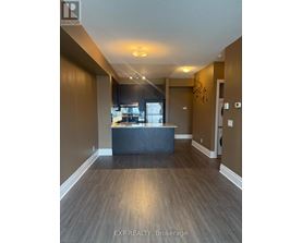 A real estate office with a counter and a window.