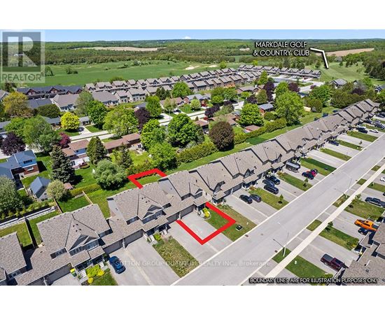 A bird's eye view of a residential area with a red line indicating a boundary.