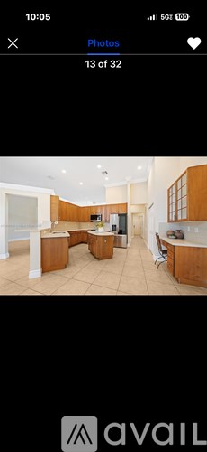 A photo gallery app showing a photo of a kitchen.