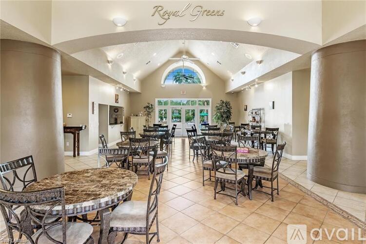 A spacious dining area with tables and chairs is available for use.