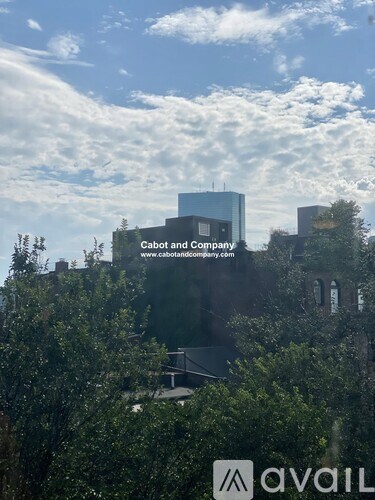 A building with the name "Cabot and Company" on it.
