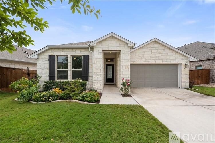 A house with a white exterior and a black front door.