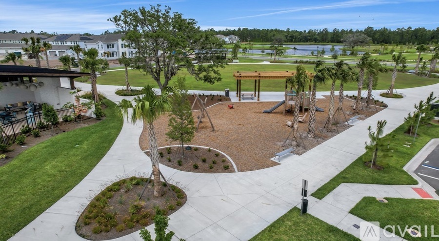 A playground with a slide and a swing set.