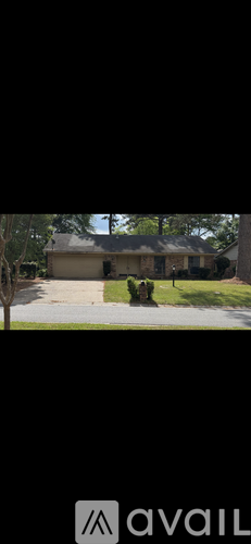 A house with a tree in front of it.