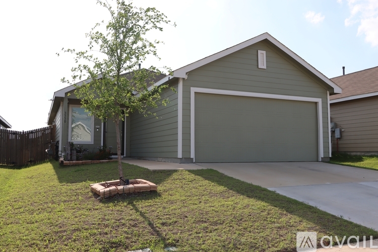 A house with a garage door that says "PRIVATE PROPERTY".