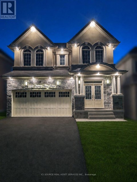 A house with a lit up sign that says "I'm a Realtor".