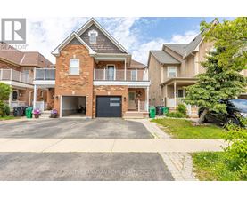 A large house with a garage is for sale.