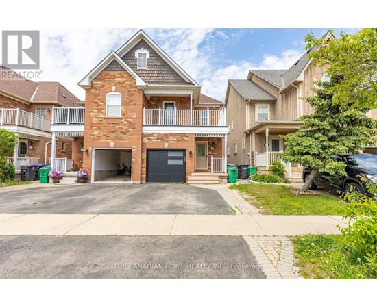 A large house with a garage is for sale.