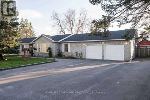 A two-story house with a garage is shown in the image.