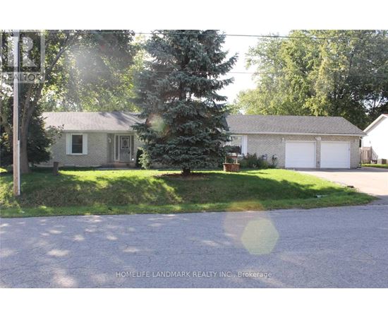 A house with a driveway in front of it.