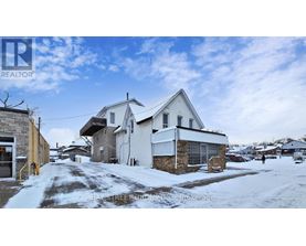 A realtor photo of a house on Bay Street, Brokering.