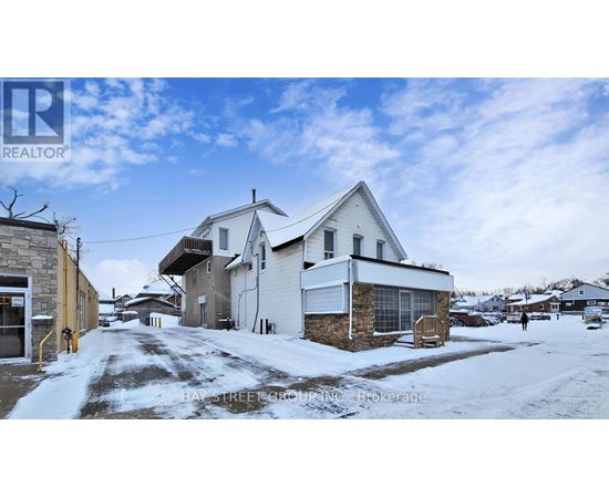 A realtor photo of a house on Bay Street, Brokering.