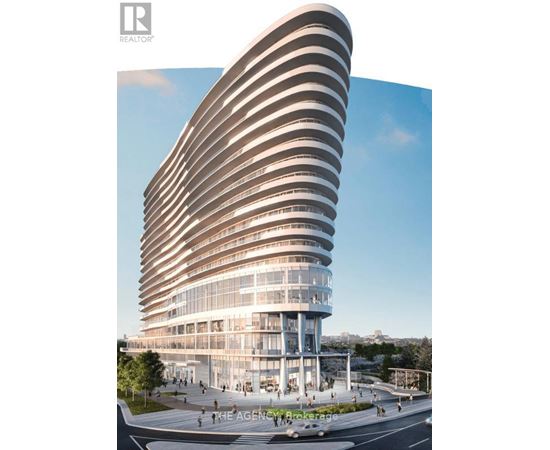 A modern building with a curved design and multiple floors.