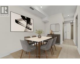A dining room with a table set for four.