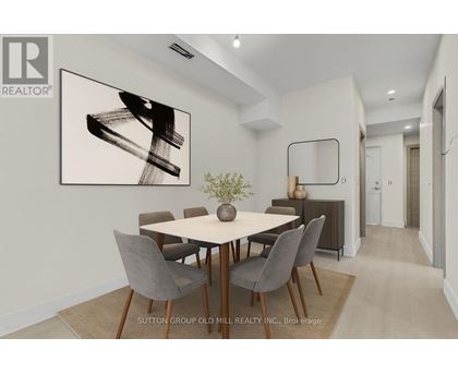 A dining room with a table set for four.