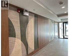 A hallway with a wooden wall and a mural on it.