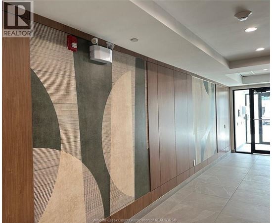 A hallway with a wooden wall and a mural on it.